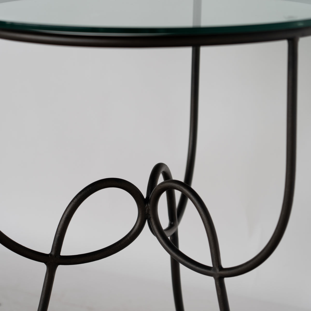Close-up of the interlocking metal loops in the base of the Entony bedside table