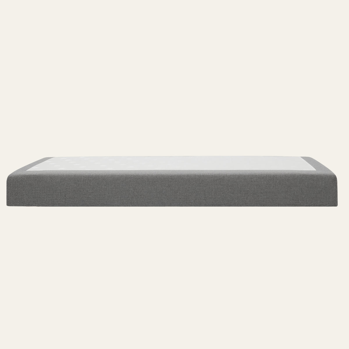 Passionata (Pockets) box spring base with grey fabric upholstery, side view against a light background