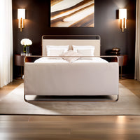 Front view luxury bed Milano with beige upholstered panels and metal frame in elegant bedroom