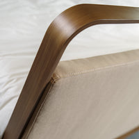 Detail curved metal frame of bed Milano with high-quality finish