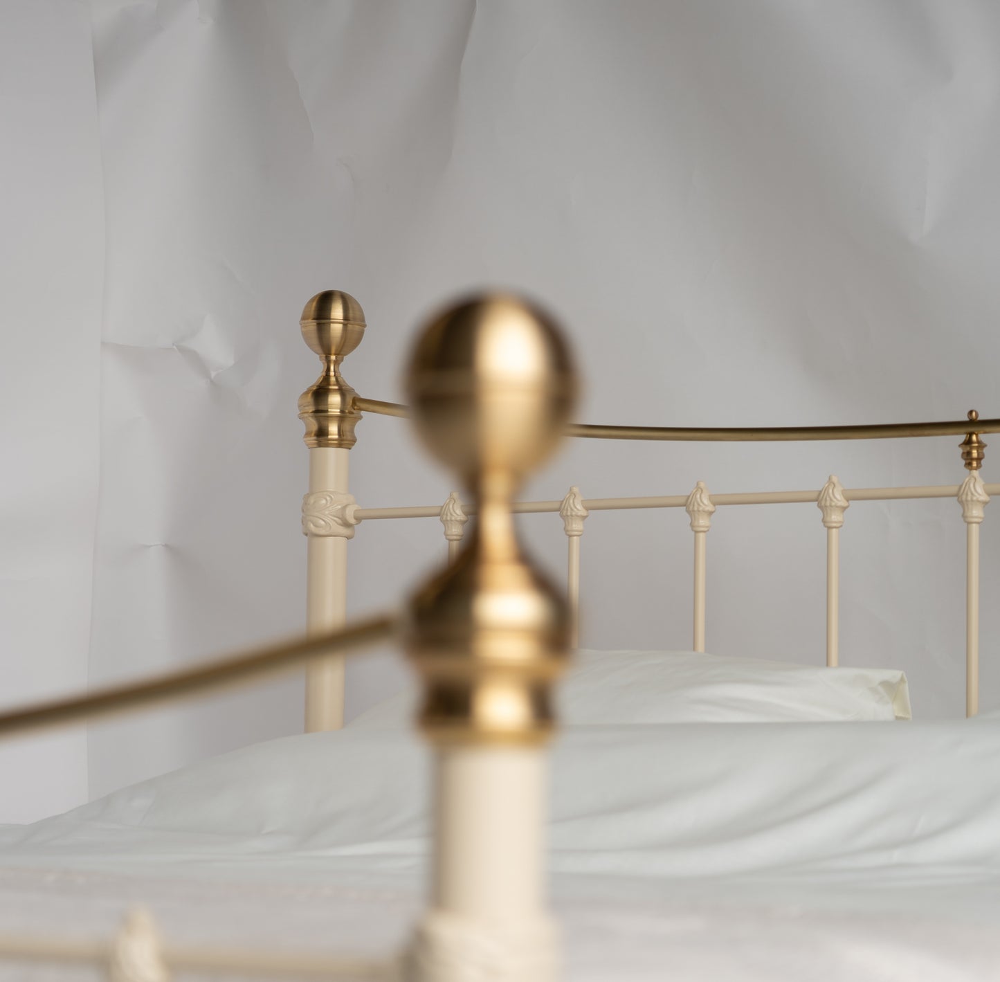 Detail gold details and cream white metal connection metal bed Wellington